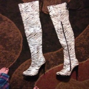 Heeled knee high zebra boots